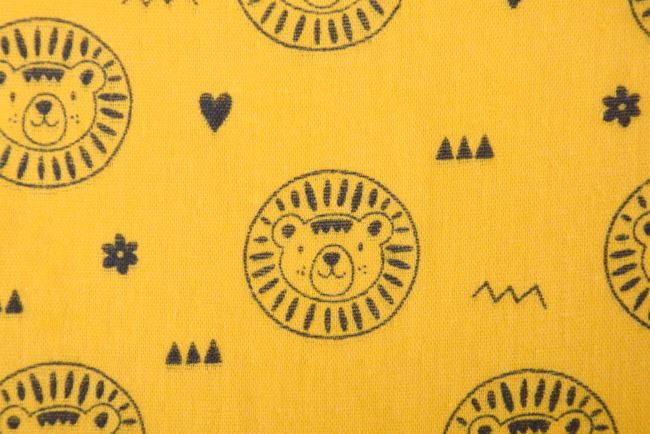 Double gauze in dark yellow with lion print 181536