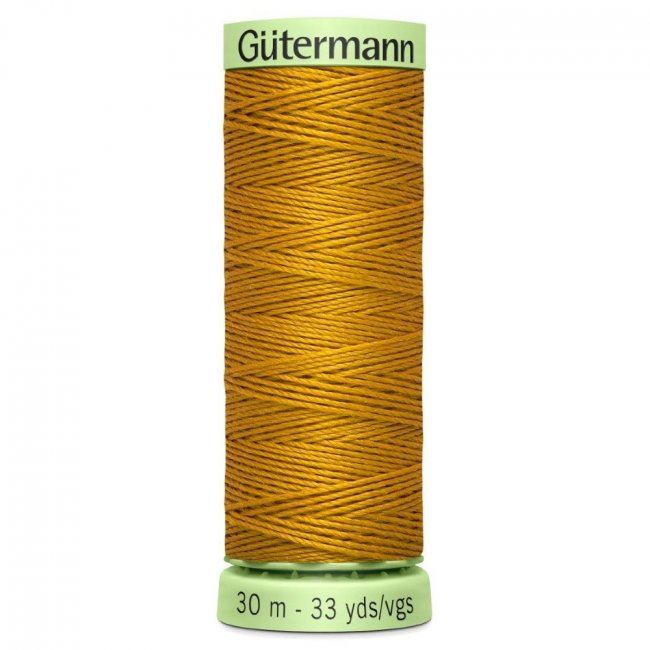 Gütermann extra strong sewing thread in golden color J-412