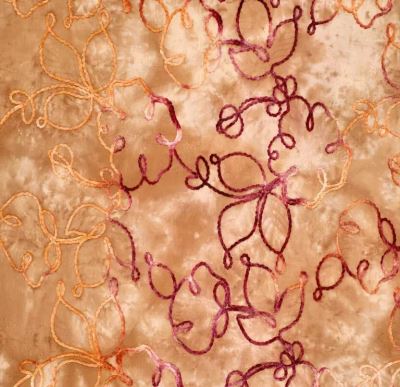 Cotton fabric with a batik look with a plastic pattern of embroidered flowers 22774/098