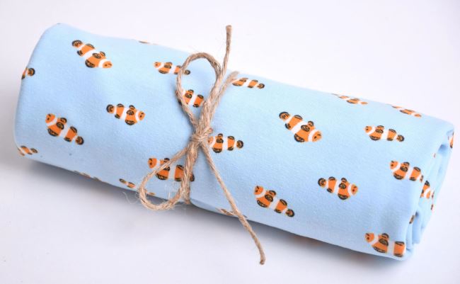 Roll of cotton knit in light blue color with fish print RO17690/003