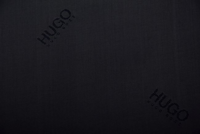 Polyester lining in black with a woven pattern of the HUGO BOSS PO28 inscription