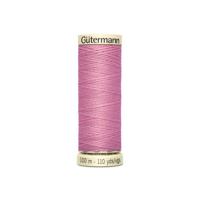 Universal sewing thread Gütermann in pink with a hint of purple 663