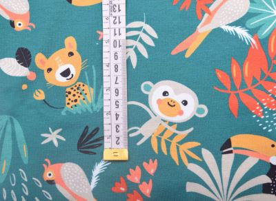 1 m of cotton knitwear in green with animal print KUP38 (1)